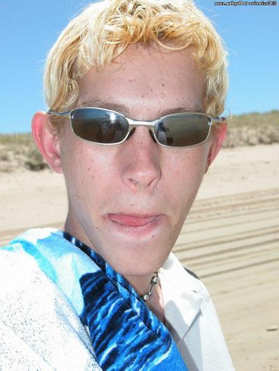 20P Blond twink Levi doffs his shirt and red undies and masturbates on the beach