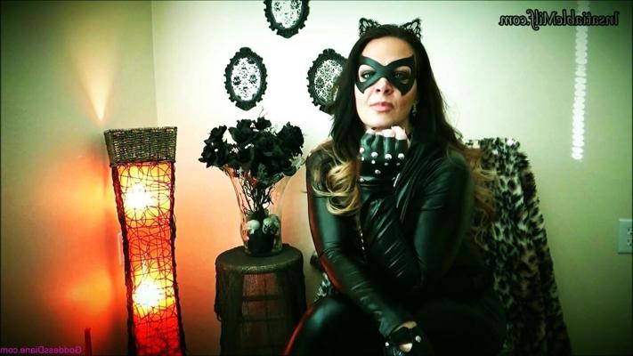 15P Horny masked mature Diane Andrews teases with her big cleavage in a solo