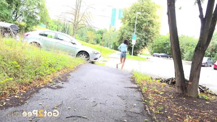15P Skinny girl Mistica gets caught taking a piss on a paved path