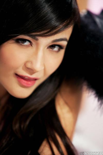 20P Asian girl Sophia Jade teases with her natural tits in a raven-wing costume