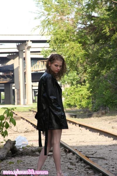 16P Sexy babe Lil Candy poses bottomless in her sheer top & leather jacket
