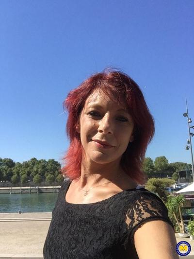 20P Sexy French redhead mature Morgane Dell flashes her cunt in public