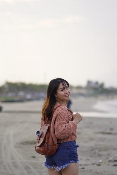 20P Beautiful Asian model poses in her sweater and jean shorts in public