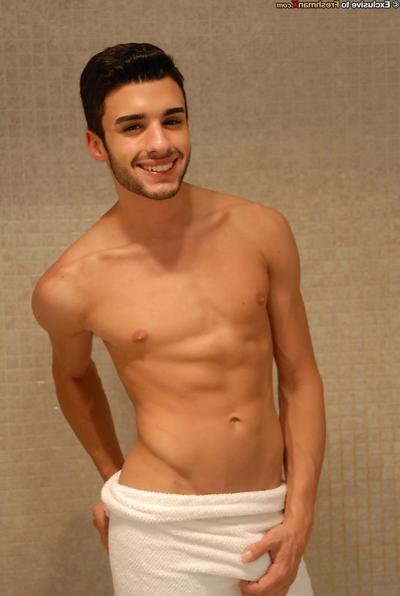 20P Dark-haired gay hottie Derek James unveils his six pack & strokes his big dick