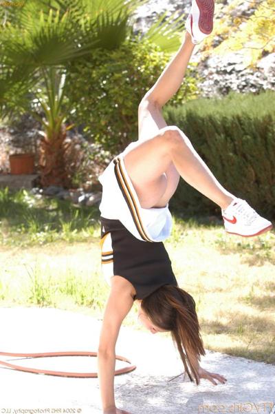 20P Pantyless brunette cheerleader Michelle does exercises in public