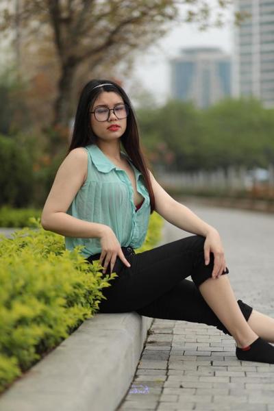 20P Pretty Asian babe Natalia posing in her sexy shirt and pants in public