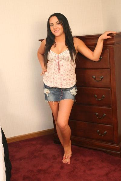 20P Brunette stunner Tessa posing in her sexy shirt and denim skirt