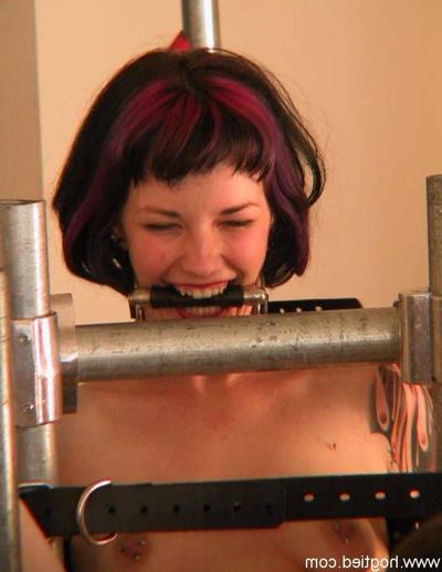 20P Submissive MILF Ambyr endures corporal punishment in metal bondage