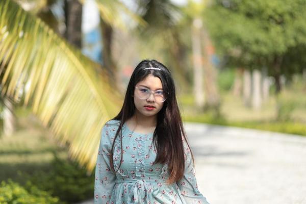 20P Dark-haired Asian babe Natalia posing in her summer dress in public
