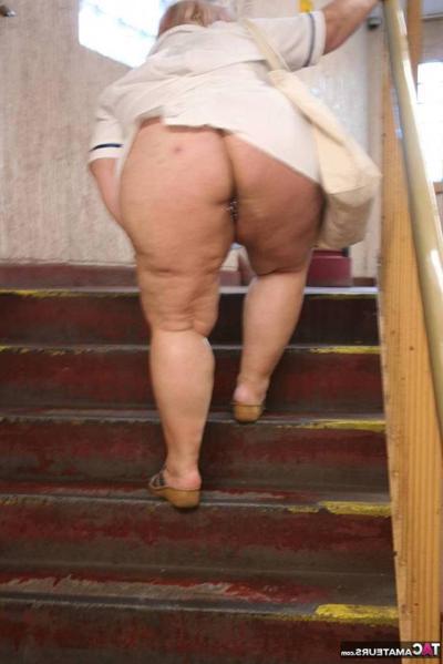 19P Fat older nurse Lexie Cummings exposes herself while walking on a sidewalk