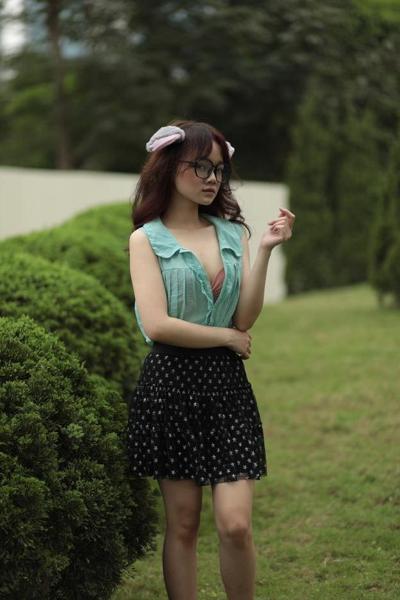 20P Gorgeous Asian teen with glasses poses in her provocative outfit outside