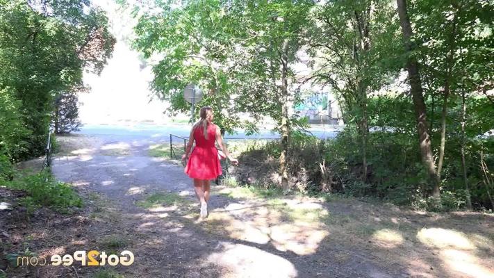 15P Nikki Dream takes a piss in a treed clearing while wearing no panties