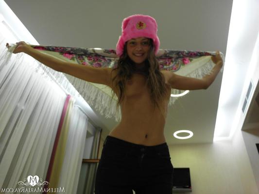 15P Skinny babe Melena Tara posing and fingering her beaver in a solo