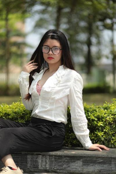20P Nerdy Asian babe Natalia posing in her sophisticated outfit outdoors