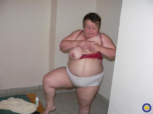 20P Short-haired BBW Marie masturbating and touching her fat body in a solo