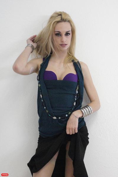 15P Blonde amateur Erica Fontes poses seductively in a tight dress and high heels