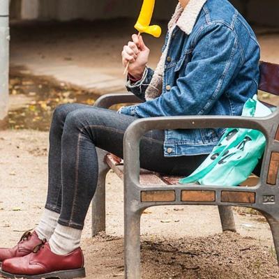 12P Gay brunette Victor A erotically sucks a sex toy lollipop on a public bench