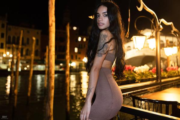 20P Latina teen Dulce flashes her pussy while posing in a short dress on a dock