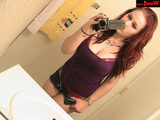 15P Sexy redheaded babe poses in her lingerie while taking selfies in the mirror