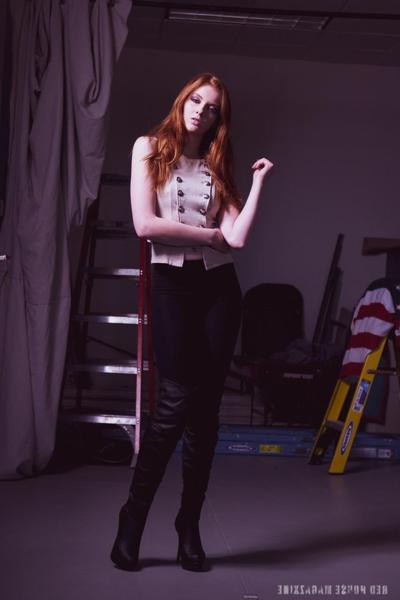20P Redheaded model Shaun Tia posing in her sexy blouse, pants and high heels
