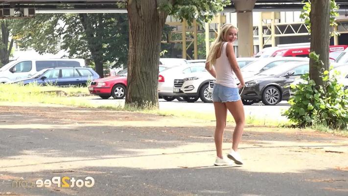 15P Pretty blonde Victoria Pure takes a badly needed pee while out in public