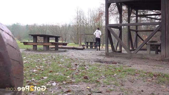 15P Caucasian girl Ali Bordeaux pees on the ground while at a public park
