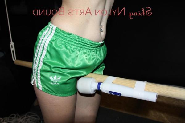 16P White girl has a vibrator applied to her cunt while restrained in nylon shorts