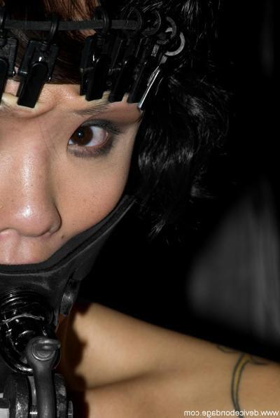 17P Pretty dark haired slave has her toes clamped in full metal bondage session