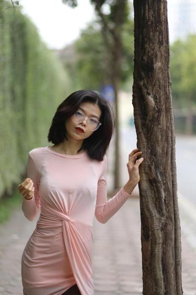 20P Breathtaking Asian model Irena posing in her sexy tight outfit outdoors