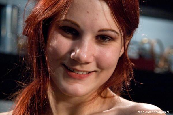 20P Redheaded babe with a big ass Zoe gets fucked by a toy from behind