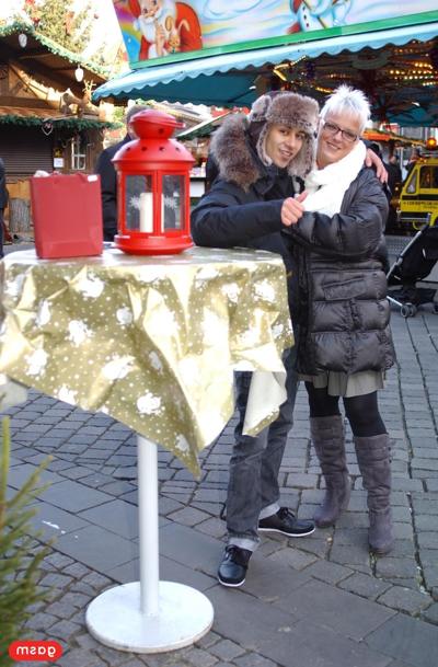 15P Short-haired German housewife flirts with a young man at the Christmas market