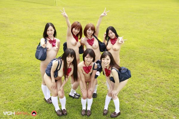 15P A group of Japanese girls pose nude in a field in white socks