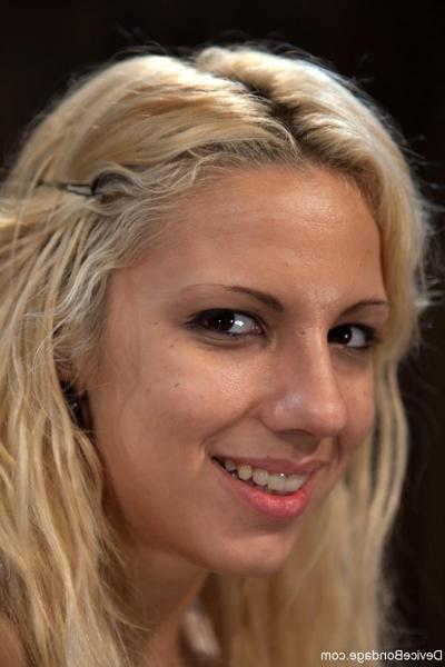 20P Blonde babe Lylith Lavey gets restrained in metal bondage while naked