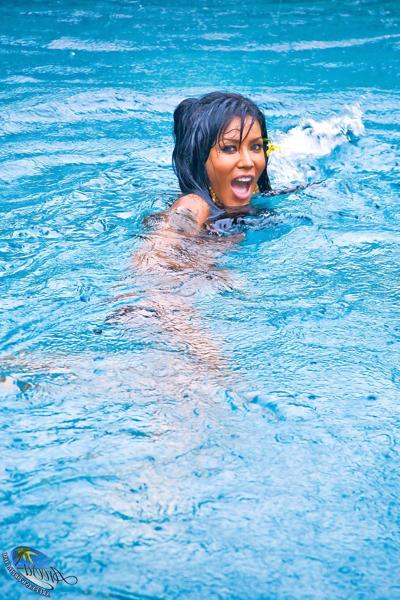20P Hot Thai shemale Areeya flaunts her big ass in a bikini & analizes herself