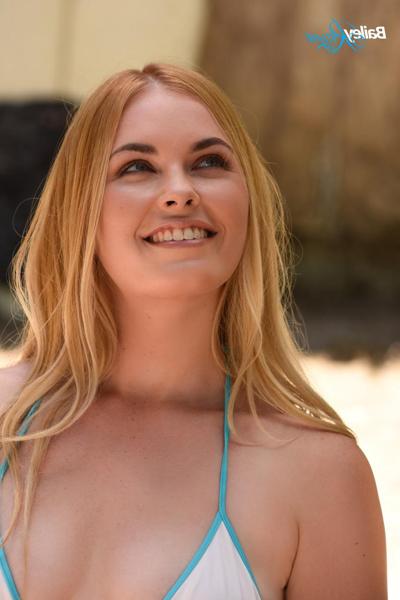 15P Hot amateur surfer Bailey Rayne strips her bikini and exposes her sexy body