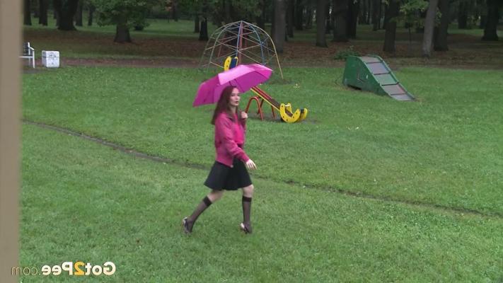15P Nice girl Oksana squats for a piss on playground equipment at a public park