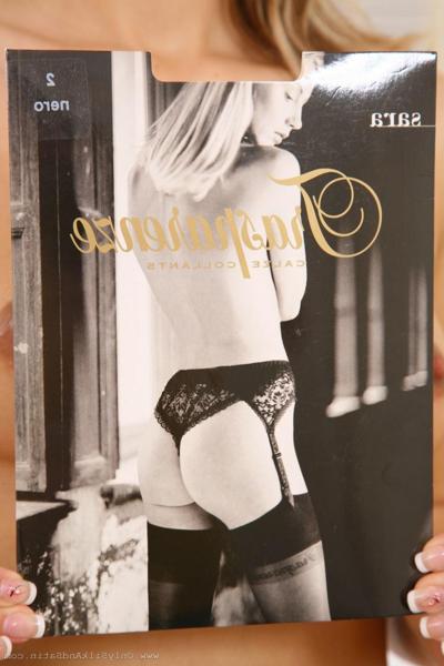 20P Naughty blonde secretary Jenni P undresses and poses in the workplace