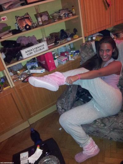 16P European teen Amira C poses enticingly while clothed in sexy outfits