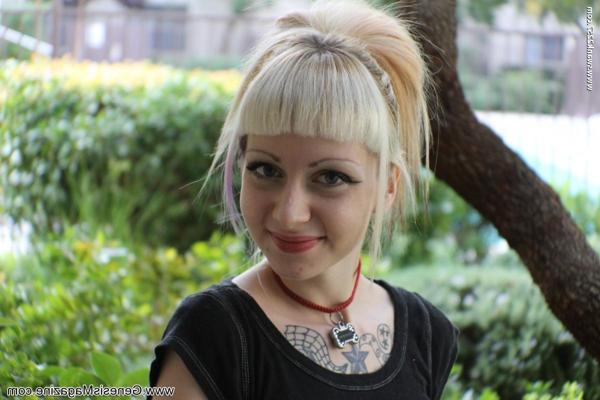 20P Blonde teen with tattoos Symone poses in a plaid skirt outdoors