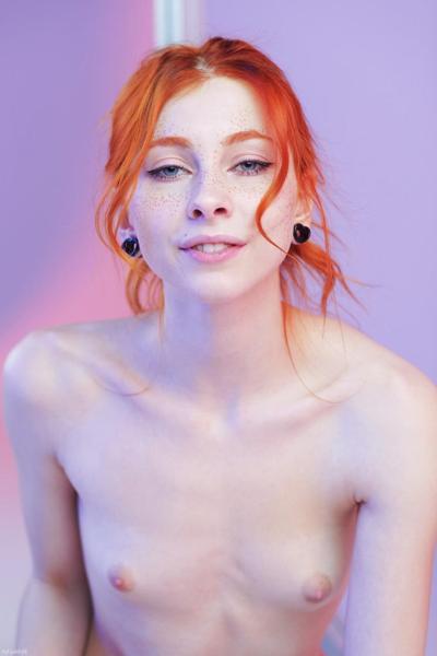 20P Glamorous redheaded teen babe Carolina Sun poses naked in front of the mirror