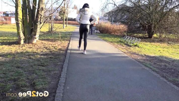 15P Dark haired girl Maddi Black takes a badly needed pee in a public park