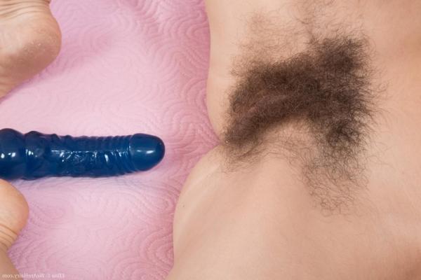 20P Horny wife Efina drops her see through clothes and sticks a toy in her beaver