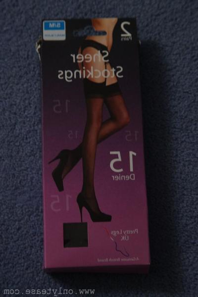 20P Pretty young Tianna kicks off her heels & poses topless in black stockings