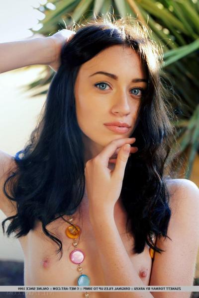 18P Dark haired teen Zsanett Tormay strikes great nude poses on a patio chair