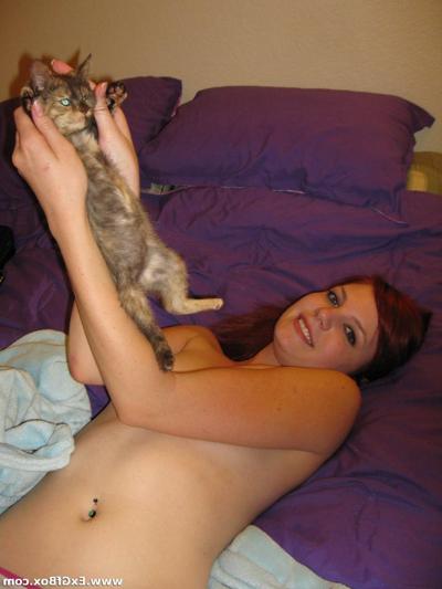 20P Redhead nympho Niccli reveals her tiny tits and poses nude all over the house