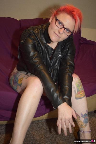 16P Thick redhead Mollie Foxxx frees her bald twat from leather pants and a thong