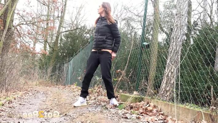 15P White girl Cynthia Vellons pulls down her pants to pee next to a fence