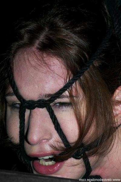 17P Naked female is restrained and hogtied before her handler masturbates her