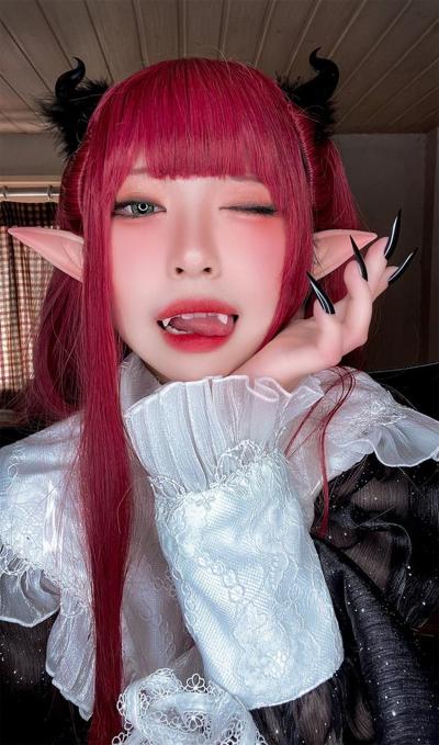 10P Redhead Asian babe with pointy ears Liz poses in a seductive lingerie
