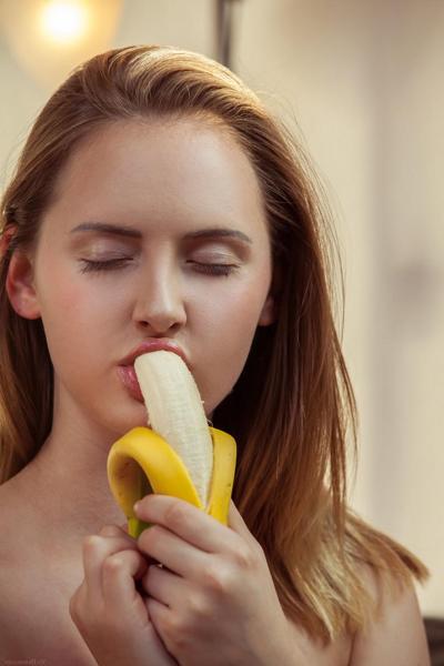 20P Glamorous babe Odena strips, unveils her curves and eats a banana in a solo